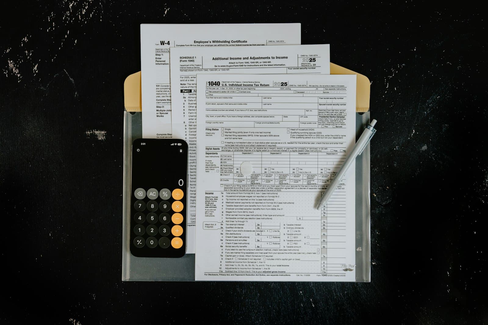 Desk with tax documents and digital accounting workflow